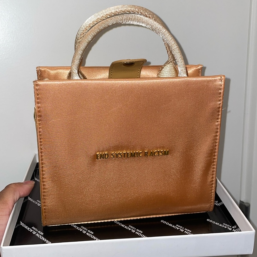 Brandon Blackwood, New York, ESR, end systematic racism, beige satin